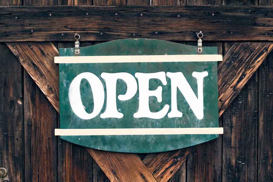 open-sign open sign on wooden door