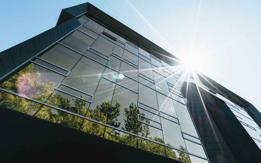 heat-island high rise building shaded with trees